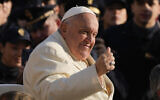 Pope Francis gives a thumbs up as he arrives for his weekly general audience in St. Peter's Square at The Vatican, November 13, 2024. (AP Photo/Gregorio Borgia)