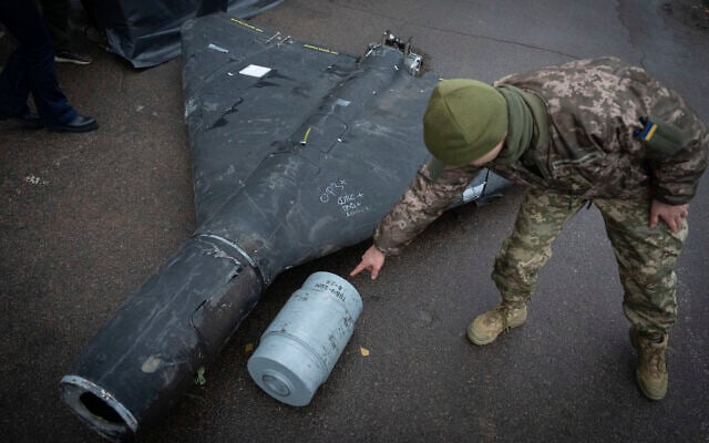 A Ukrainian officer shows a thermobaric charge of a downed Shahed drone launched by Russia in a research laboratory in an undisclosed location in Ukraine, Nov. 14, 2024. (AP Photo/Efrem Lukatsky) A Ukrainian officer shows a thermobaric charge of a downed Shahed drone launched by Russia in a research laboratory in an undisclosed location in Ukraine, Nov. 14, 2024. (AP Photo/Efrem Lukatsky)