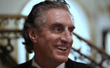 North Dakota Governor Doug Burgum arrives before US President-elect Donald Trump at an America First Policy Institute gala at his Mar-a-Lago estate, November 14, 2024, in Palm Beach, Florida. (AP Photo/Alex Brandon)