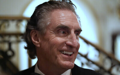 North Dakota Governor Doug Burgum arrives before US President-elect Donald Trump at an America First Policy Institute gala at his Mar-a-Lago estate, November 14, 2024, in Palm Beach, Florida. (AP Photo/Alex Brandon)