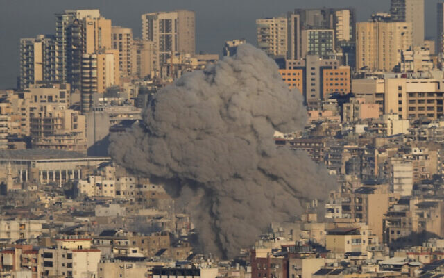 Smoke rises between buildings after an Israeli airstrike in Dahiyeh, in the southern suburbs of Beirut, Lebanon, November 15, 2024. (AP Photo/Hussein Malla) Smoke rises between buildings after an Israeli airstrike in Dahiyeh, in the southern suburbs of Beirut, Lebanon, November 15, 2024. (AP Photo/Hussein Malla)