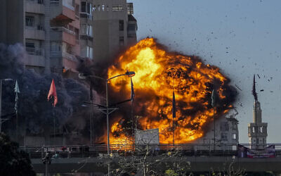 Thick smoke and flames erupt as a result of an Israeli airstrike on Tayouneh, Beirut, Lebanon, November 15, 2024. (AP Photo/Hassan Ammar)