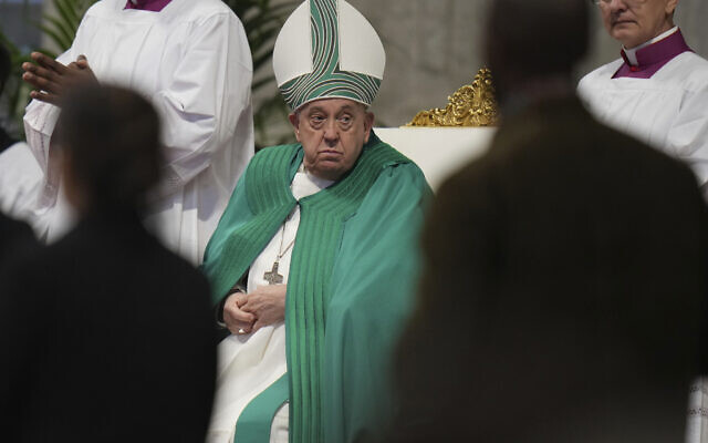 Pope Francis presides over a mass on the occasion of the World Day of the Poor in St. Peter's Basilica, at the Vatican, on November 17, 2024. (AP Photo/ Alessandra Tarantino)