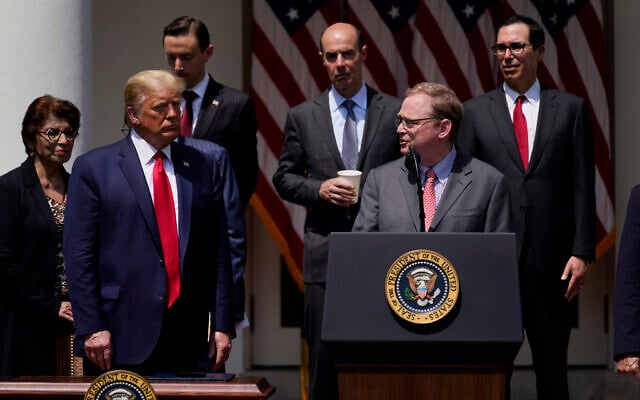 File: Then-White House senior adviser Kevin Hassett speaks as then-US president Donald Trump and others listen during a news conference in the Rose Garden of the White House, June 5, 2020, in Washington. (AP Photo/Evan Vucci) File: Then-White House senior adviser Kevin Hassett speaks as then-US president Donald Trump and others listen during a news conference in the Rose Garden of the White House, June 5, 2020, in Washington. (AP Photo/Evan Vucci)