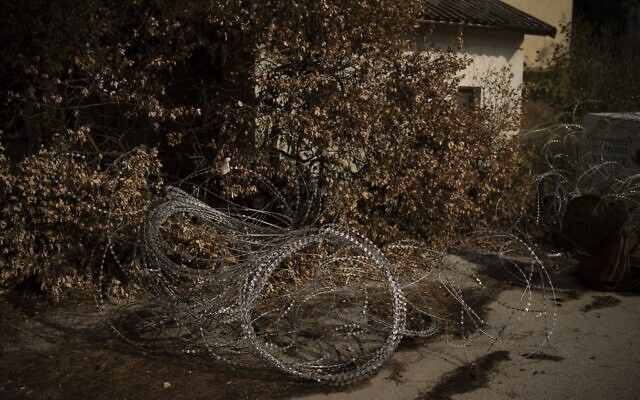 Barbed wires are set on an area in front of a house in Kibbutz Manara in northern Israel, November 28, 2024. (AP Photo/Leo Correa)