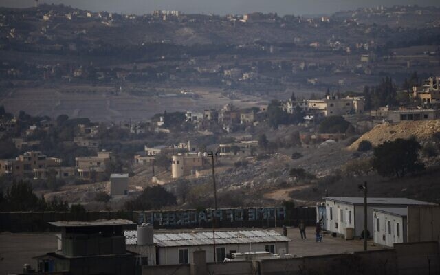 UN soldiers stand at a base of the United Nations peacekeeping forces in Lebanon (UNIFIL) at the Israeli-Lebanese border, as seen from Kibbutz Manara in northern Israel on November 28, 2024. (AP Photo/Leo Correa)