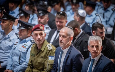 IDF Chief of Staff Herzi Halevi, Ronen Bar, head of the Shin Bet security agency, and Mossad chief David Barnea attend a ceremony at the Mount Herzl military cemetery in Jerusalem, May 8, 2024.  (Chaim Goldberg/Flash 90)