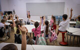 Illustrative photo of students on the first day of school, at the Gabrieli Carmel School in Tel Aviv, on September 1, 2024. (Avshalom Sassoni/Flash90)