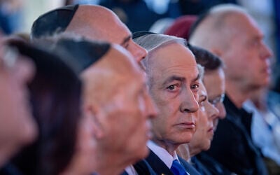 Prime Minister Benjamin Netanyahu at a state ceremony marking the Hebrew calendar anniversary of the Hamas invasion and massacre on October 7, 2023, at Mount Herzl military cemetery in Jerusalem on October 27, 2024. (Chaim Goldberg/Flash90)