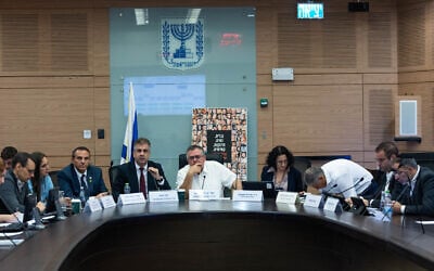 David Bitan, chairman of the Knesset Economics Committee (c) at the Knesset in Jerusalem, on November 11, 2024. (Yonatan Sindel/Flash90)