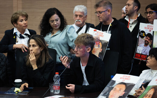 Ofir Angrest (c) brother of hostage Matan Angrest, speaks at a meeting of the Constitution, Law and Justice Committee in the Knesset in Jerusalem, on November 18, 2024. (Yonatan Sindel/Flash90) Ofir Angrest (c) brother of hostage Matan Angrest, speaks at a meeting of the Constitution, Law and Justice Committee in the Knesset in Jerusalem, on November 18, 2024. (Yonatan Sindel/Flash90)