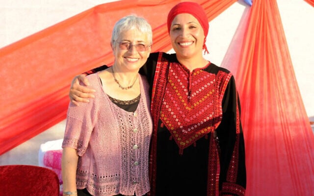 Vivian Silver, left and Amal Alsana-Alhjooj, when they worked together in the early 2000s, at AJEEC in the Negev, an organization for social change (Courtesy) Vivian Silver, left and Amal Alsana-Alhjooj, when they worked together in the early 2000s, at AJEEC in the Negev, an organization for social change (Courtesy)