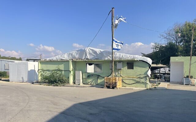 A single wall, photographed on November 3, 2024,  is all that remains of the foreign workers' accommodation that was invaded by Hamas terrorists on October 7, 2023. (Sue Surkes/Times of Israel)
