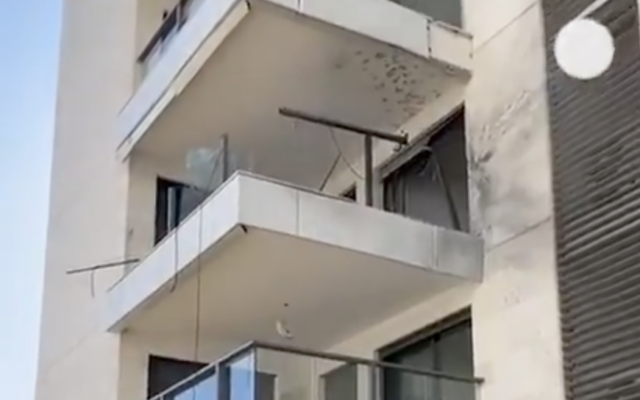 Footage posted to social media purports to show damage to a building in Nahariya from a drone fired from Lebanon, November 16, 2024. (Screenshot, used in accordance with Clause 27a of the Copyright Law) Footage posted to social media purports to show damage to a building in Nahariya from a drone fired from Lebanon, November 16, 2024. (Screenshot, used in accordance with Clause 27a of the Copyright Law)