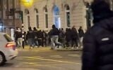 Screenshot from a video shows violence on the streets of Amsterdam in which Israelis were attacked by anti-Israel gangs on November 8, 2024. (X screenshot; used in accordance with Clause 27a of the Copyright Law)