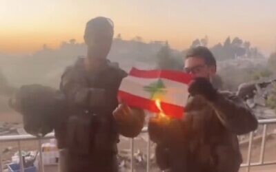 IDF soldiers burn a Lebanese flag in a video posted on social media on November 8, 2024. (Screen capture/X)