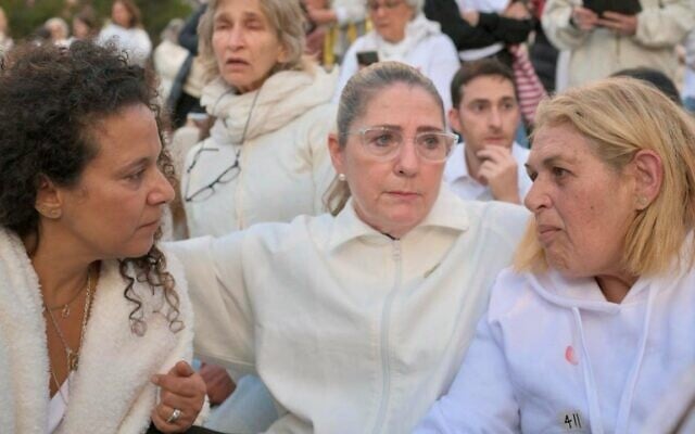 Niva Wenkert, left, Michal Herzog and Simona Steinbrecher at the Shift 101 silent protest in Jerusalem on November 20, 2024. (Mishmeret 101/Yadin Giladi) Niva Wenkert, left, Michal Herzog and Simona Steinbrecher at the Shift 101 silent protest in Jerusalem on November 20, 2024. (Mishmeret 101/Yadin Giladi)
