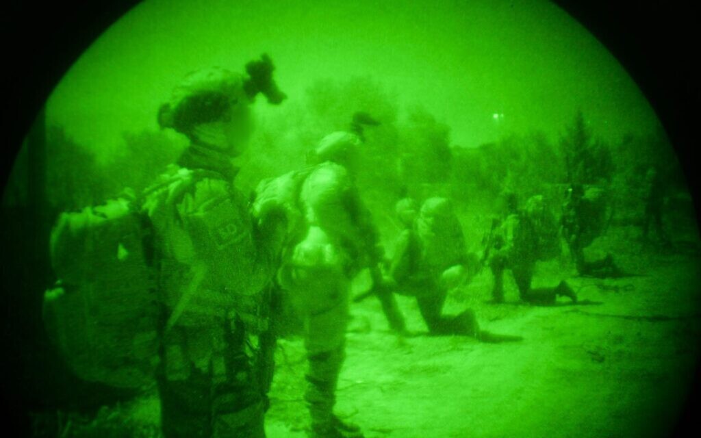 Troops of the IDF Commando Brigade operate in southern Lebanon, in a handout photo issued on November 16, 2024. (Israel Defense Forces)