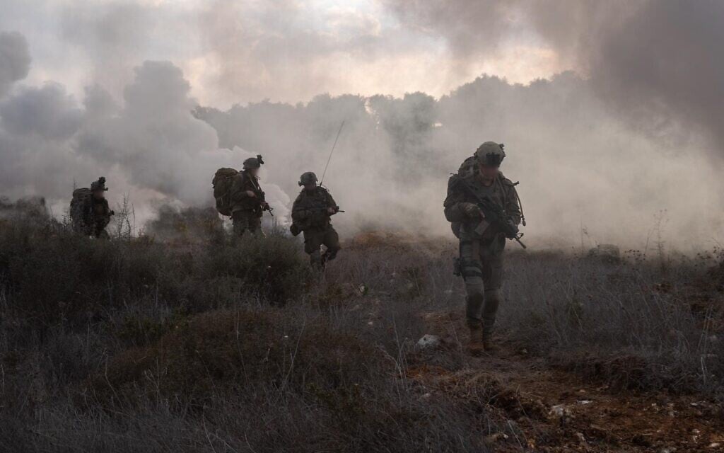 Troops of the Commando Brigade operate in southern Lebanon, in a handout photo issued on November 26, 2024. (Israel Defense Forces)