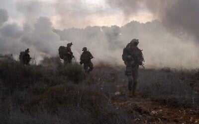 Troops of the Commando Brigade operate in southern Lebanon, in a handout photo issued on November 26, 2024. (Israel Defense Forces)