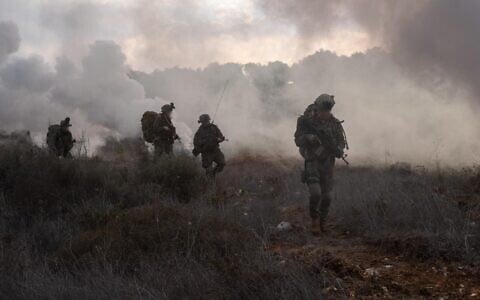 Troops of the Commando Brigade operate in southern Lebanon, in a handout photo issued on November 26, 2024. (Israel Defense Forces)