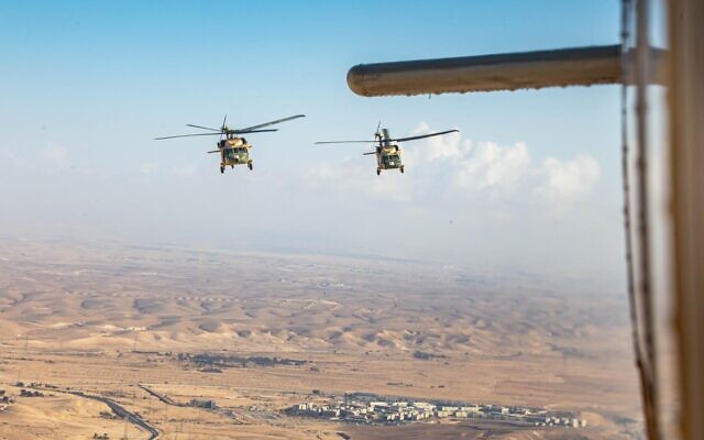 Jordanian Air Force helicopters are seen overhead as they make their way to deliver aid to the Gaza Strip, November 20, 2024. (Israel Defense Forces)