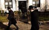 Illustrative: Men walking in Crown Heights, Brooklyn, New York, in 2017. (Amir Levy/ Getty Images/ File)