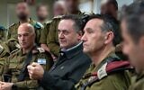 Defense Minister Israel Katz (center) during a visit to Northern Command with IDF Chief of Staff Lt. Gen. Herzi Halevi (2R) on November 13, 2024. (Ariel Hermoni/Defense Ministry)