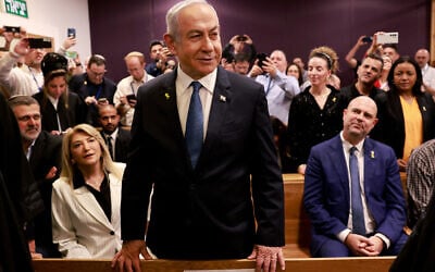 Prime Minister Benjamin Netanyahu attends a hearing in his trial on corruption charges at the district court in Tel Aviv on December 10, 2024. (Menahem Kahana/Pool via Reuters)