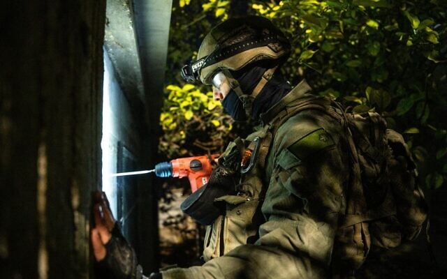 IDF troops measure the home of a Hamas terrorist in the West Bank village of Einabus, near Nablus, October 1, 2024. (Israel Defense Forces) IDF troops measure the home of a Hamas terrorist in the West Bank village of Einabus, near Nablus, October 1, 2024. (Israel Defense Forces)