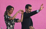 Syria's President Bashar al-Assad (center) and his wife Asma al-Assad (left) attend the opening ceremony of the 2022 Asian Games at the Hangzhou Olympic Sports Centre Stadium in Hangzhou in China's eastern Zhejiang province on September 23, 2023. (Philip FONG / AFP)