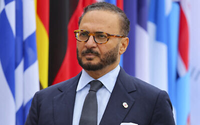 The diplomatic advisor to the United Arab Emirates president, Anwar Gargash, arrives to attend the opening ceremony of the summit on peace in Ukraine, at the luxury Burgenstock resort, near Lucerne, Switzlernand, June 15, 2024. (Denis Balibouse/Pool/AFP)