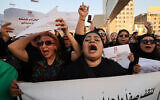 Iraqi women demonstrate against underage marriage in Tahrir Square in central Baghdad on August 8, 2024. (AHMAD AL-RUBAYE / AFP)