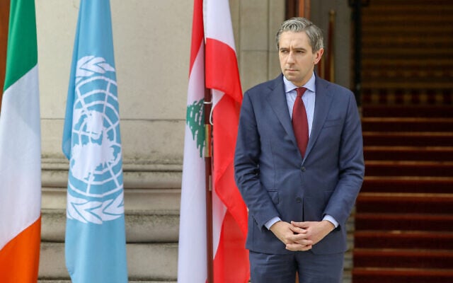 Ireland's Prime Minister Simon Harris awaits the arrival of Lebanon's Prime Minister Najib Mikati at Government Buildings, Tithe an Rialtais, in Dublin, on October 25, 2024. (Paul Faith / AFP)