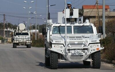 United Nations Interim Force in Lebanon (UNIFIL) vehicles patrol the southern Lebanese city of Marjayoun, near the border with Israel, on November 29, 2024. (AFP)