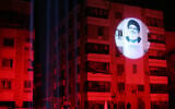 A portrait of Hezbollah's late chief Hassan Nasrallah is projected on a building during a vigil at the site where he was killed in a September Israeli air strike, in the Haret Hreik neighborhood of Beirut's southern suburbs on November 30, 2024. - (IBRAHIM AMRO / AFP)