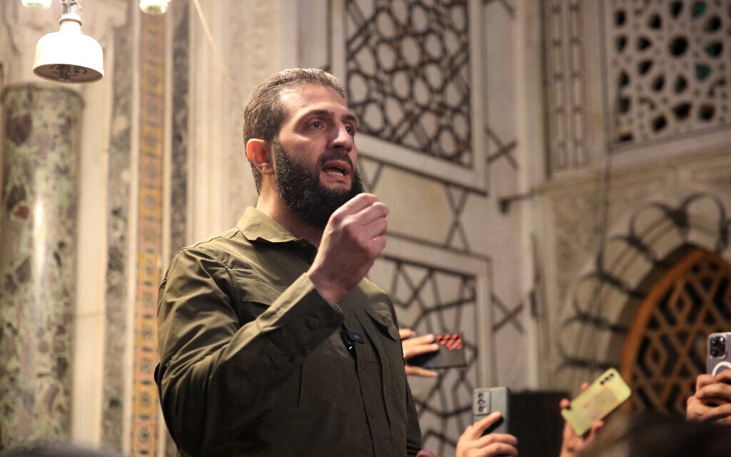 Syrian rebel leader says he will announce list of former officials wanted for torture