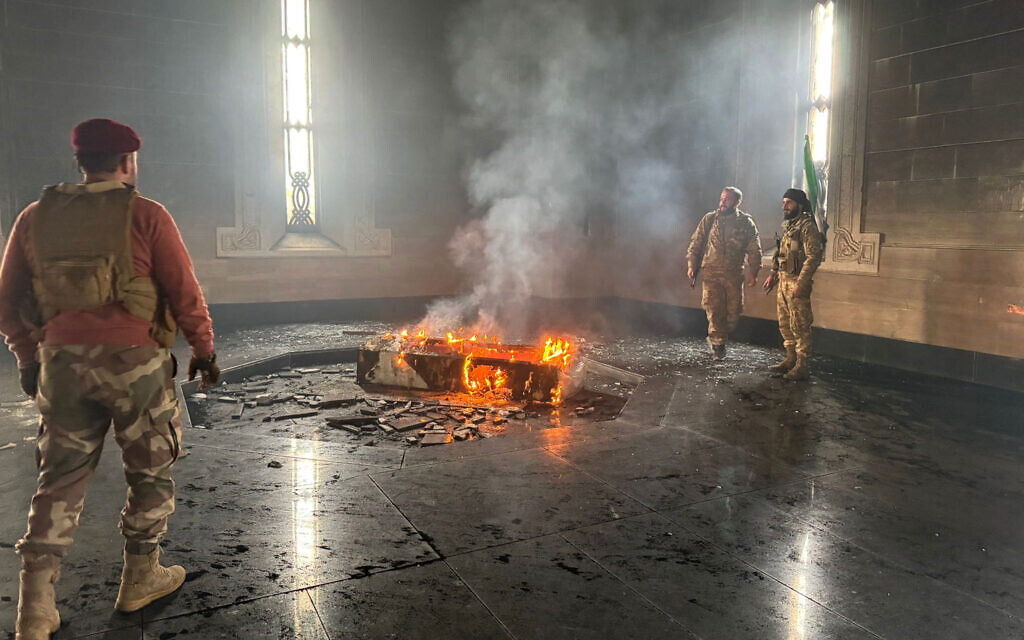 After fall of dynasty, tomb of Assad’s father set on fire in Syria hometown