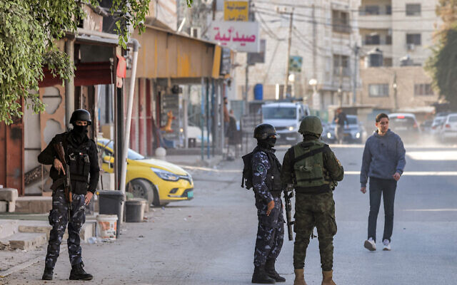 Palestinian security forces deploy to Jenin in the north of the West Bank on December 17, 2024. (Photo by Jaafar Ashtiyeh/AFP) Palestinian security forces deploy to Jenin in the north of the West Bank on December 17, 2024. (Photo by Jaafar Ashtiyeh/AFP)