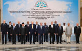 In this handout picture released by the Iranian presidential office, heads of state and delegates pose for a group picture during the D-8 summit in Cairo, on December 19, 2024. (IRANIAN PRESIDENCY / AFP)