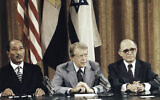US President Jimmy Carter, center, is flanked by Prime Minister Menachem Begin (right) and Egypt's President Anwar Sadat as they faced newsmen at the conclusion of their discussions toward Middle East Peace moves at Carter's Camp David retreat in Maryland in September 1978. (AP Photo)