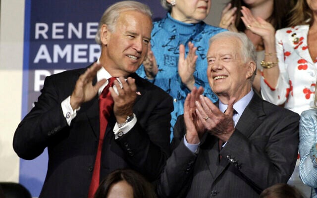 File - Then-senator Joe Biden and former US president Jimmy Carter are seen at the Democratic National Convention in Denver, August 26, 2008. (AP Photo/Paul Sancya) File - Then-senator Joe Biden and former US president Jimmy Carter are seen at the Democratic National Convention in Denver, August 26, 2008. (AP Photo/Paul Sancya)