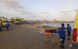 Illustrative: Rescuers wait on the beach of Marsa Alam, Egypt, November 25, 2024. (AP Photo)