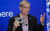 Intel CEO Pat Gelsinger speaks while holding a new chip, called Gaudi 3, during an event in New York, on December 14, 2023. (AP Photo/Seth Wenig, File)