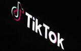 A TikTok sign is displayed on top of their building in Culver City, California, on December 3, 2024. (AP Photo/Richard Vogel)