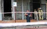 Fire crew members and police officers work the scene of an arson attack at Adass Israel Synagogue in the suburb of Ripponlea, Melbourne, Australia, December 6, 2024. (Con Chronis/AAP Image via AP)