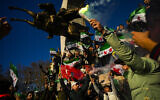 People gather to celebrate the Syrian government fall in Istanbul, Turkey, Sunday, December 8, 2024. (AP Photo/Emrah Gurel)