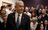Prime Minister Benjamin Netanyahu arrives at the Tel Aviv District Court to testify in his long-running trial for alleged corruption, in Tel Aviv, December 10, 2024. (Menahem Kahana/Pool Photo via AP)