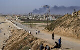 FILE - Smoke rises after an Israeli airstrike in the central Gaza Strip, July 10, 2024. (AP Photo/Abdel Kareem Hana, File)