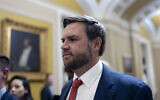 Sen. JD Vance, Republican of Ohio, the US vice president-elect, leaves the Senate chamber as lawmakers work on an interim spending bill to avoid a shutdown of federal agencies, at the Capitol in Washington, Wednesday, Dec. 18, 2024. (AP Photo/J. Scott Applewhite)